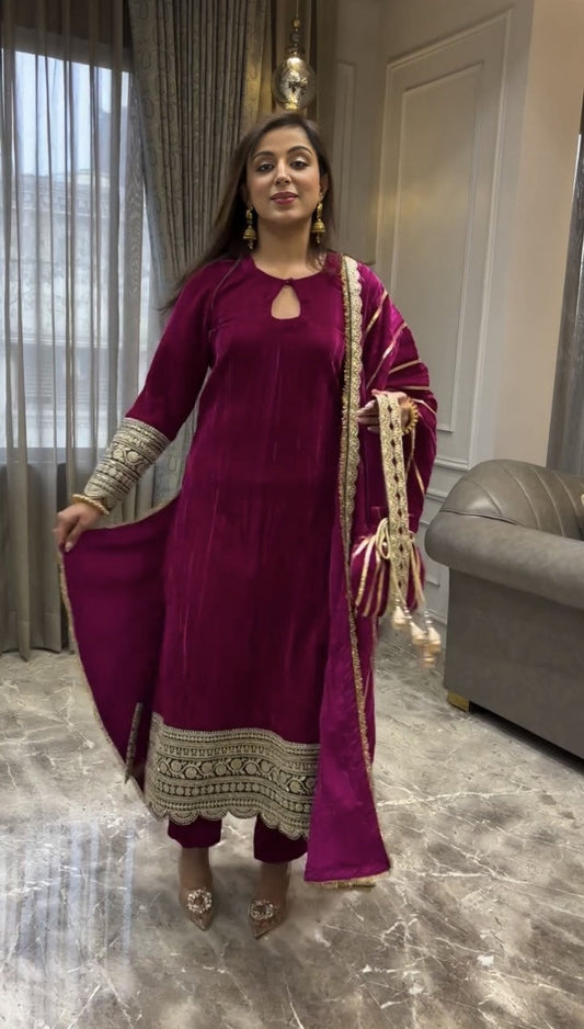 "Elegant Rani-pink Suits: Perfect for the Winter Chill"