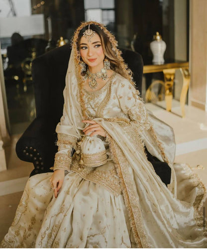 A Timeless Portrait of a Beautiful Adorned in Traditional Wedding Attire