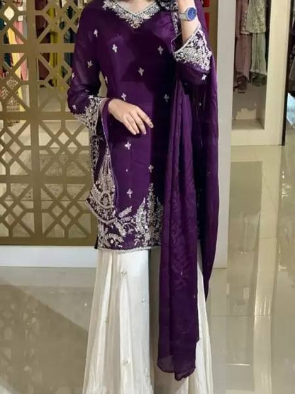 A Showcase of Pakistani Dress Styles in Four Captivating Colors Worn by a Graceful Woman