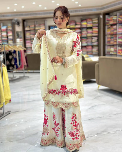 A Fashionable Woman in a White and Pink Suit Ensemble