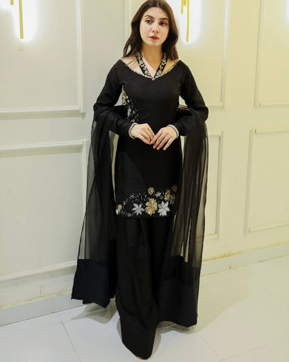 Confident Elegance in Black Suit