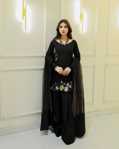 Confident Elegance in Black Suit