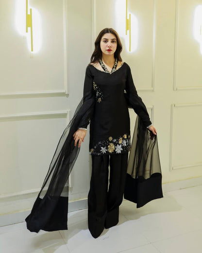 Confident Elegance in Black Suit