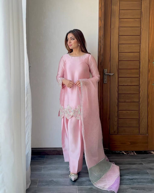 A Fashion-Forward Woman in Pink Suit