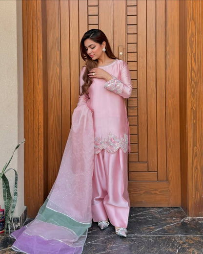 A Fashion-Forward Woman in Pink Suit