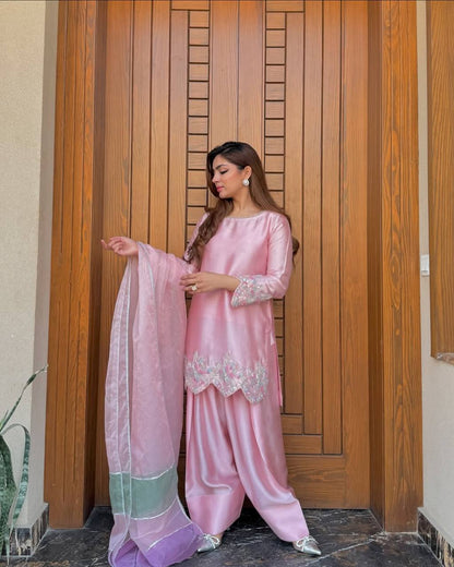 A Fashion-Forward Woman in Pink Suit